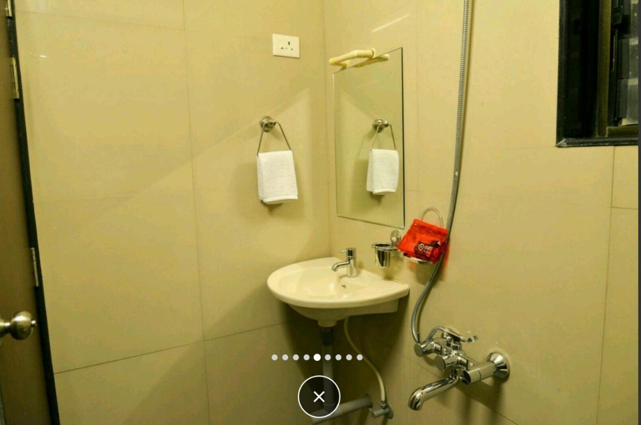 Hotel Midtown Inn Nashik Buitenkant foto
